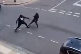 Two men seen fighting with Rambo knives on Cadoxton Avenue in Tottenham
