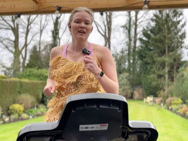 Rebecca Richmond-Smith singing the entire 46-song setlist while running on a treadmill.