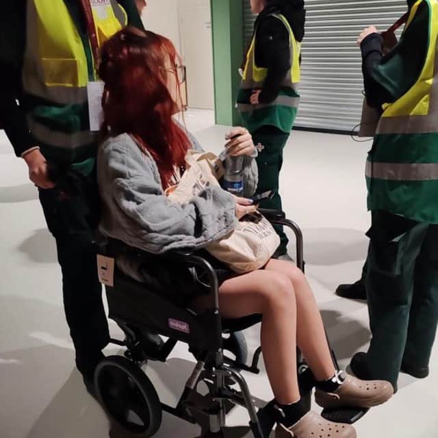 Grace McAleavy, 18, sits in a wheelchair following the suspected spiking. 