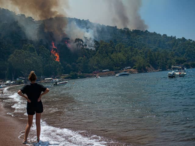 British tourists in Greece have been slapped with an "emergency alert" as a ferocious wildfire rages across the holiday hotspot.