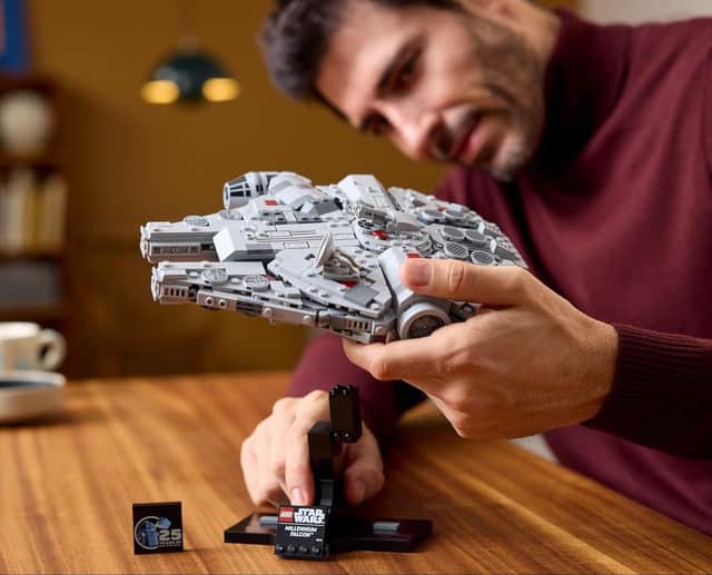 The anniversary brick and stand of the Star Wars Lego Millennium Falcon is pictured
