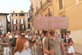 Anti-mass tourism protesters march through Palma’s streets.