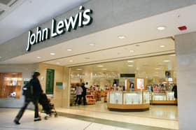 John Lewis profits rise.