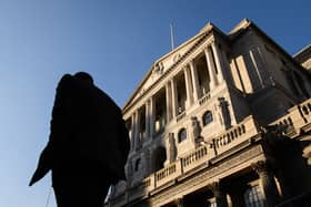 City workers walk past the Bank of England in London (Photo: Leon Neal/Getty Images)