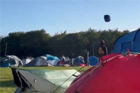 Tent hurtles across sky as Storm Lilian hits Leeds Festival.