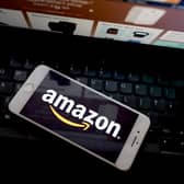 Amazon app seen on a mobile phone. Photo by Edward Smith/Getty Images