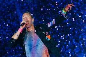 Coldplay have announced huge shows in the UK for their Music Of The Spheres tour. 