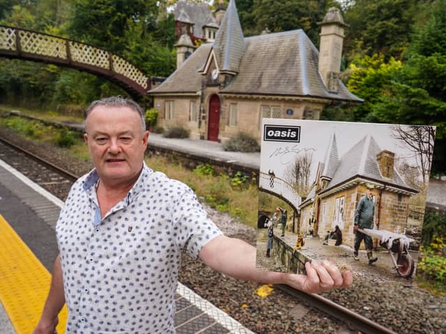 Tim Collis with his holiday cottage at Cromford Station, used as the location for the artwork for Some Might Say by Oasis.