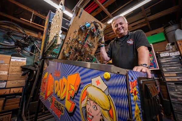 Dr Pinball Mark Squires at his home in Swavesey, Cambridgeshire where he fixes and restores pinball machines.