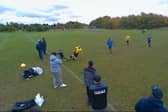 Reggie, 12, accidentally being slide tackled by non-league footballer Terry.