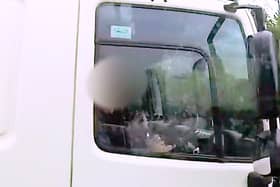 Shocking footage shows HGV driver caught eating yoghurt at the wheel