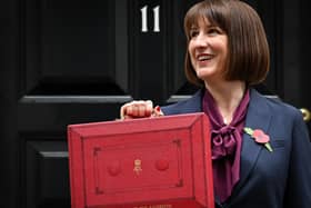 Rachel Reeves poses with the red Budget Box as she leaves 11 Downing Street to present the government's annual Autumn budget to Parliament (Photo: JUSTIN TALLIS/AFP via Getty Images)