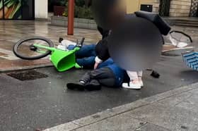 E-bike rider crashes into a child crossing a cycle lane to reach a "floating" bus stop.