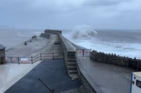 Huge waves crash into Porthcawl pier.
