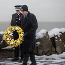 Paying respects at the Gynn Square memorial service to officers who died in the 1983 rescue mission at Blackpool.|Lucinda Herbert, Blackpool Gazette
