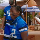 Player 952 (front left) won the island on Beast Games