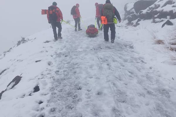 Injured man rescued from snow-covered mountain