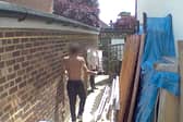 Couple say neighbours 'land-grabbed' their garden while they were away.