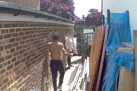 Couple say neighbours 'land-grabbed' their garden while they were away.