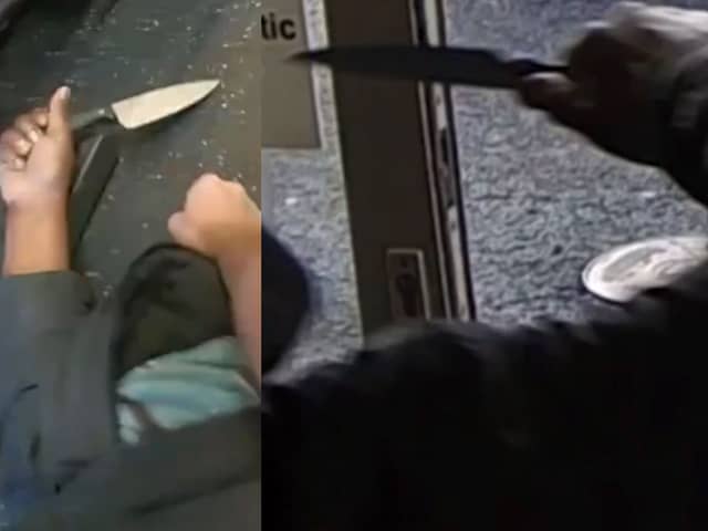 Police officer wrestles and disarms knifeman.