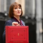 Rachel Reeves, poses with the red Budget Box as she leaves 11 Downing Street to present the government's annual budget to Parliament in October 2024 (Photo: Leon Neal/Getty Images)