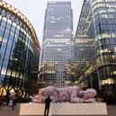 An eight meter long giant has appeared in Canary Wharf