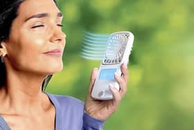 The fan's built-in water tank creates an evaporative effect to blast you with a cold mist
