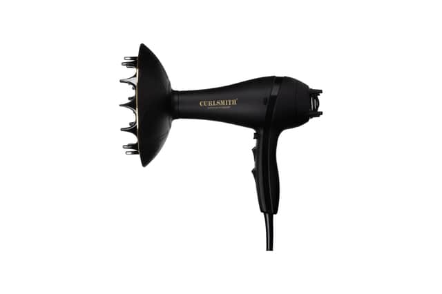 The Curlsmith Defrizzion Hair Dryer includes an extra-large diffuser designed to help define curls while reducing frizz