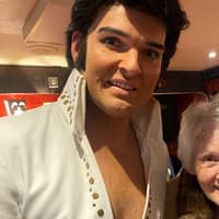 Surrey care home resident enjoys Elvis tribute night at local theatre