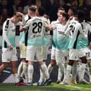 Joao Pedro of Brighton & Hove Albion (obscured) celebrates with teammates after scoring the team's first goal from the penalty spot during the UEFA Europa League 2023/24 match betweek AEK Athens FC and Brighton & Hove Albion on November 30, 2023 in Athens, Greece. (Photo by Milos Bicanski/Getty Images)