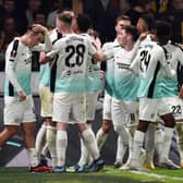 Joao Pedro of Brighton & Hove Albion (obscured) celebrates with teammates after scoring the team's first goal from the penalty spot during the UEFA Europa League 2023/24 match betweek AEK Athens FC and Brighton & Hove Albion on November 30, 2023 in Athens, Greece. (Photo by Milos Bicanski/Getty Images)