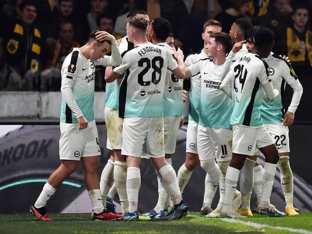 Joao Pedro of Brighton & Hove Albion (obscured) celebrates with teammates after scoring the team's first goal from the penalty spot during the UEFA Europa League 2023/24 match betweek AEK Athens FC and Brighton & Hove Albion on November 30, 2023 in Athens, Greece. (Photo by Milos Bicanski/Getty Images)
