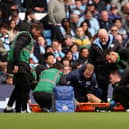 Solly March leaves the field on a stretcher after receiving medical treatment during the Premier League match between Manchester City and Brighton & Hove Albion at Etihad Stadium on October 21, 2023 in Manchester, England. (Photo by Charlotte Tattersall/Getty Images)