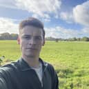 Cllr Josh Brown near former green belt land earmarked for housing (image supplied by Cllr Josh Brown)