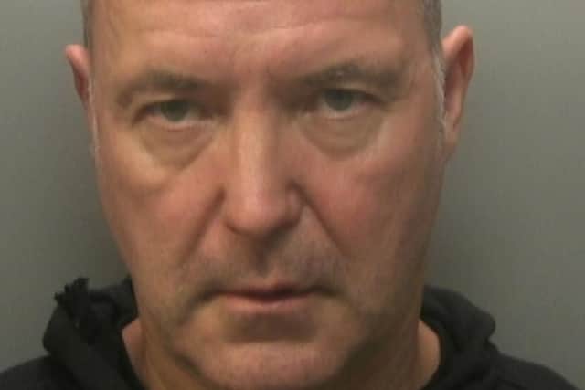 Surrey Police are appealing for the public’s help to find Gregory Pawsey, 54, from London, who we would like to speak to in connection with an investigation of robbery in Redhill. Picture courtesy of Surrey Police
