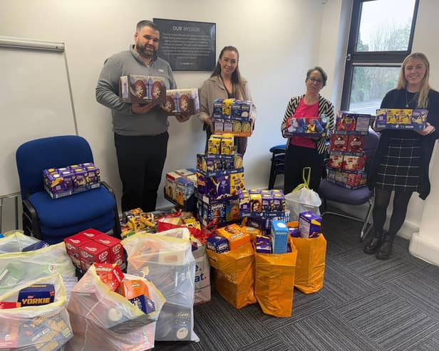 The HML team donating their impressive collection