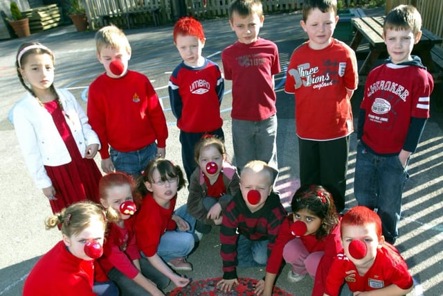 Manorfield School children place money on the Red Nose