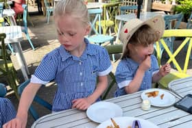 Enjoying freshly cooked chips from the freshest potatoes!