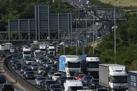 A Friday rush-hour traffic jam is pictured on the M25 London orbital motorway, anti-clockwise lanes near Heathrow Airport, west of London on July 21, 2023 (Photo by JUSTIN TALLIS / AFP) (Photo by JUSTIN TALLIS/AFP via Getty Images)