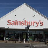 People are queueing for cash points outside Sainsbury’s stores in Sussex after a major IT fault, which has prevented card payments.