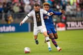 Germany's #16 Pascal Groß and USA's #08 Weston McKennie fight for the ball during the international friendly match between Germany and USA at Pratt & Whitney Stadium, in East Hartford, Connecticut, on October 14, 2023. (Photo by EDUARDO MUNOZ / AFP) (Photo by EDUARDO MUNOZ/AFP via Getty Images)