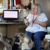 Beekeeper Michelle Ernoult talks to pre-prep children at Highfield and Brookham. Picture: submitted