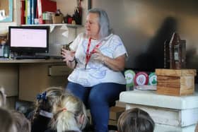 Beekeeper Michelle Ernoult talks to pre-prep children at Highfield and Brookham. Picture: submitted
