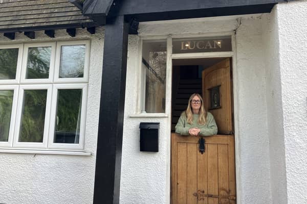 Amy Bonner in the doorway of her house in Laleham. (Credit: Emily Dalton/LDRS)