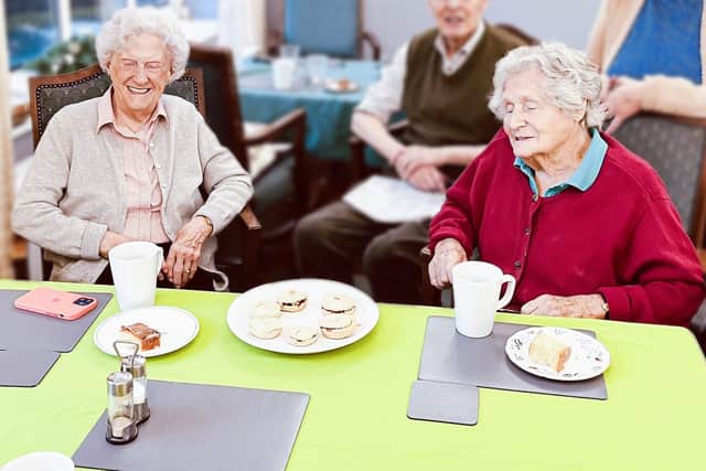 Redcot Residents, Joyce Douglas and Ruth Dickson enjoying the Christmas Mince Pies. Picture: submitted