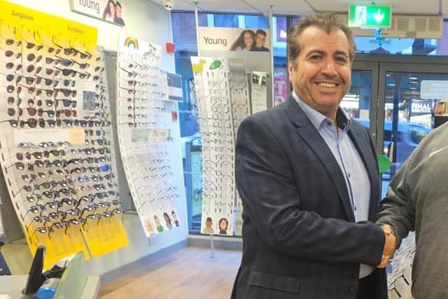 Kirk Ritchie, Surrey FA, with Specsavers Dorking ophthalmic director Yehia Al-Omari