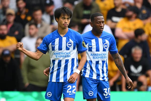 WOLVERHAMPTON, ENGLAND - AUGUST 19: Kaoru Mitoma of Brighton & Hove Albion celebrates after scoring the team's first goal  during the Premier League match between Wolverhampton Wanderers and Brighton & Hove Albion at Molineux on August 19, 2023 in Wolverhampton, England. (Photo by Clive Mason/Getty Images)