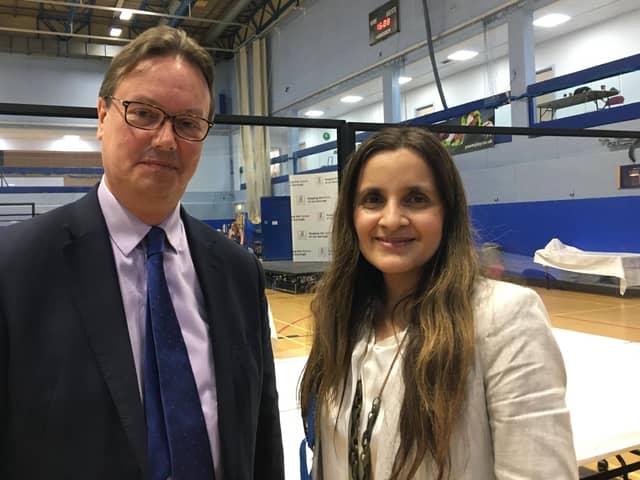 Woking's Conservative MP Jonathan Lord and outgoing council leader Ayesha Azad