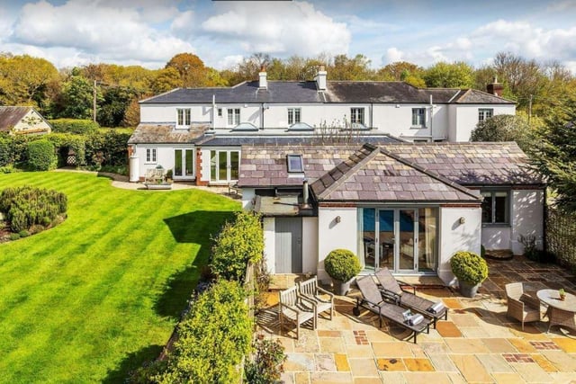 The properties are set in the Surrey Hills surrounded by National Trust land