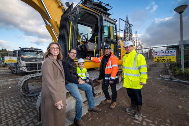 Louie Thomas on a digger alongside his parents, Amy and Dave Thomas, Sam Tunnicliff, contract manager for Collard Contracting, and Paul Coombes, production director from Miller Homes Southern